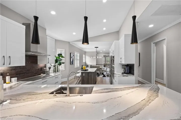 Large peninsula with plenty of room for seating and separate center island