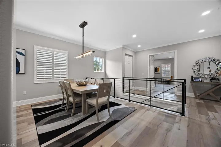 Dining room and renovated stairway/railing