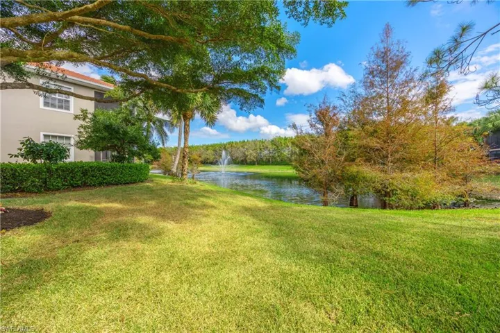 Lake behind the property with water feature