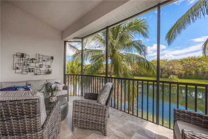 Tiled lanai with view of the lake