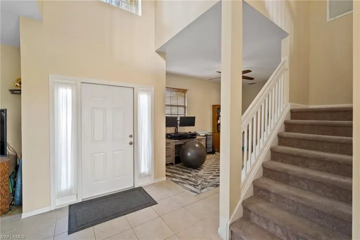 Entry with one of the 2 first floor staircase entrances