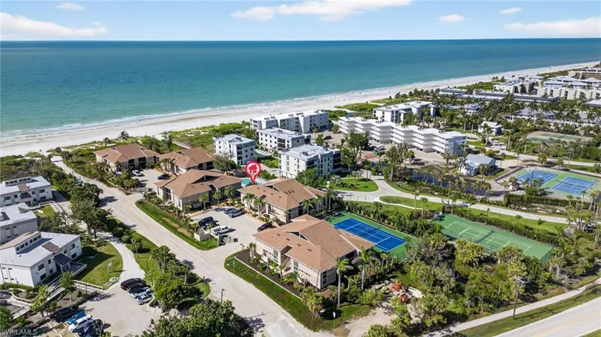 Bird's eye view of waterfront with a beach