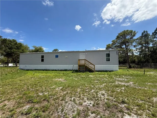 Light gray exterior siding and white trim