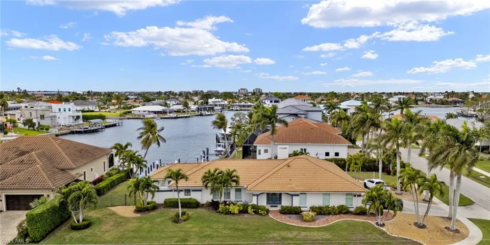 Aerial view of residential area with a nearby body of water