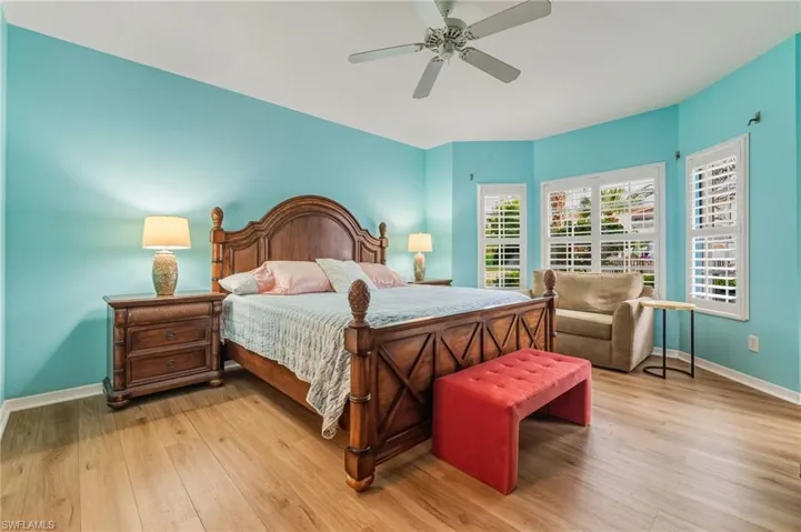 Bedroom featuring light wood finished floors and a ceiling fan