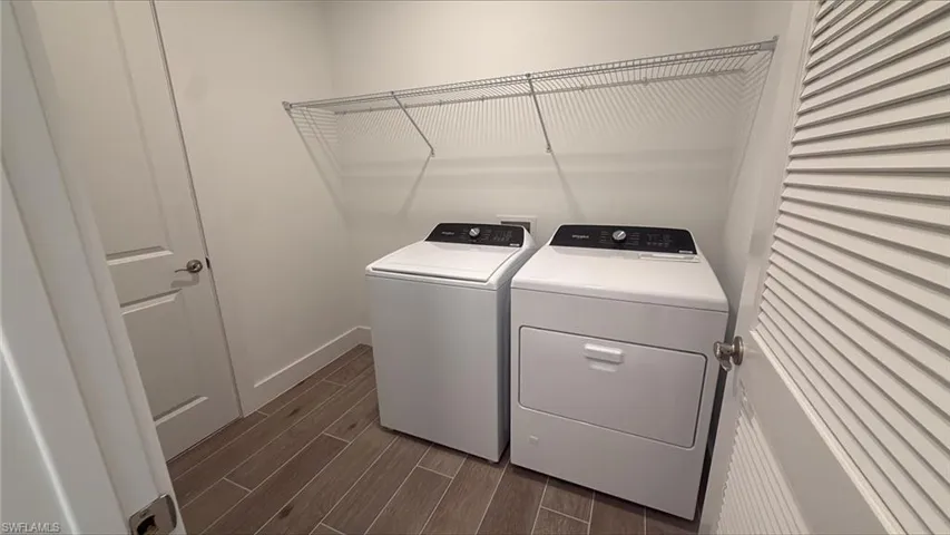 Laundry room with Whirlpool washer and gas dryer