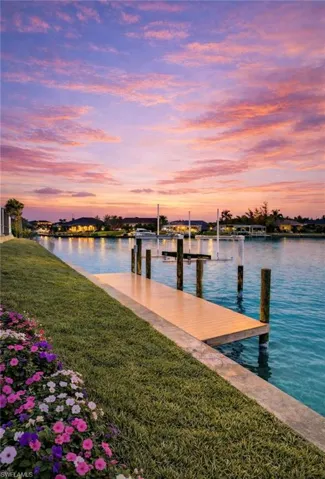 Dock with a yard and a water view (Rendered photo)