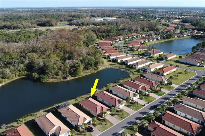 View of property location with nearby suburban area
