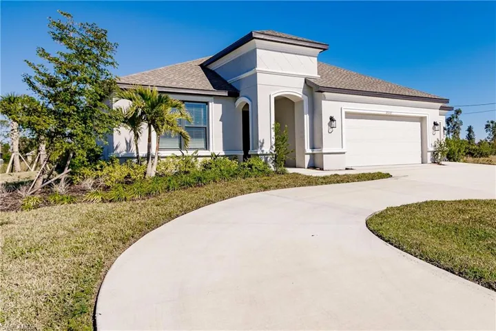 You'll love the three car garage and three car driveway, plus the circular driveway.  Room for 8 cars in the driveway, plus room to build additional garage spaces if wanted.