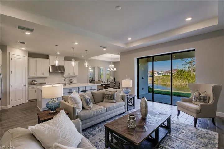 The living room is open to the kitchen and dining room.