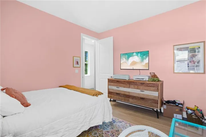 Bedroom featuring wood finished floors