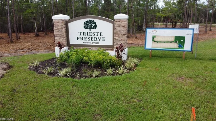 Community sign with a lawn
