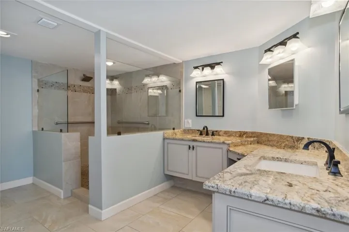 Primary Bath, dual sinks, huge walk in shower, separate water closet and storage closet