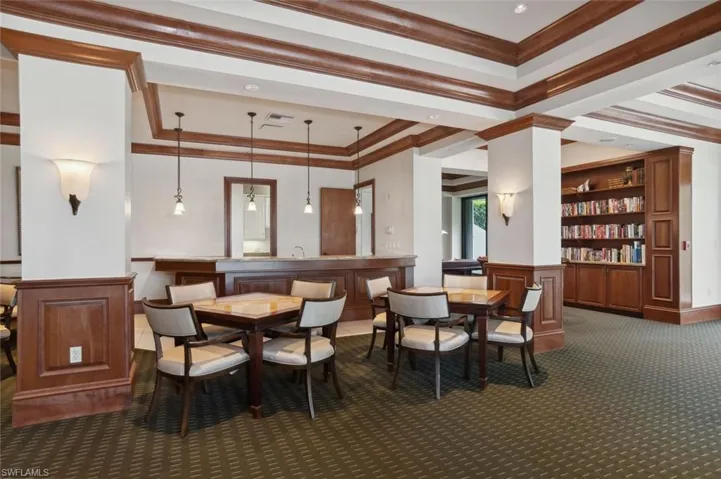 Social Activity Room pool table, dining area, wet bar, kitchen, library