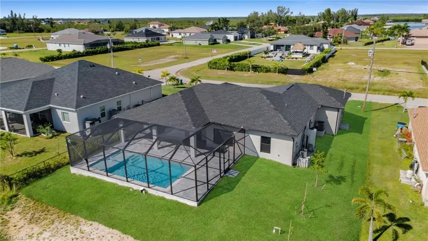 Aerial view of residential area with a pool
