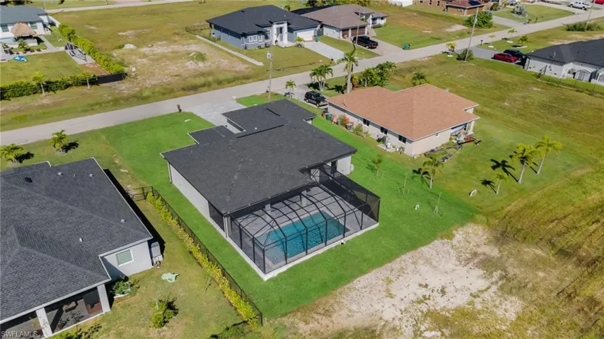 Aerial view of residential area with a pool area