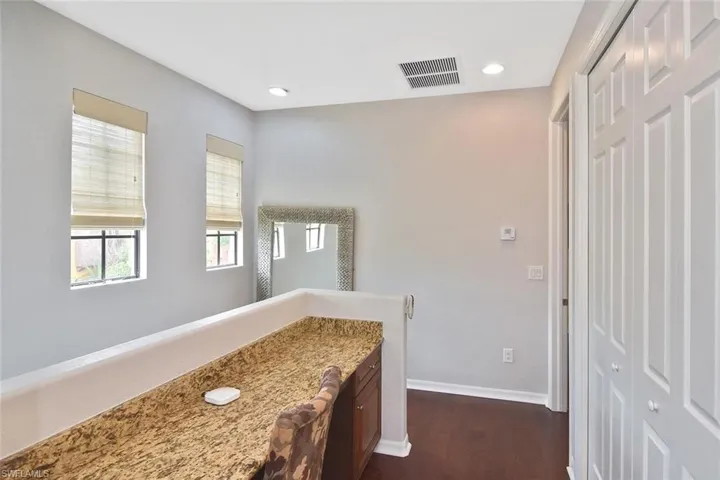 At the top of the stairs, find a workstation perfect for your home office.