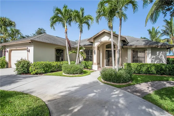 Ranch-style house featuring a garage