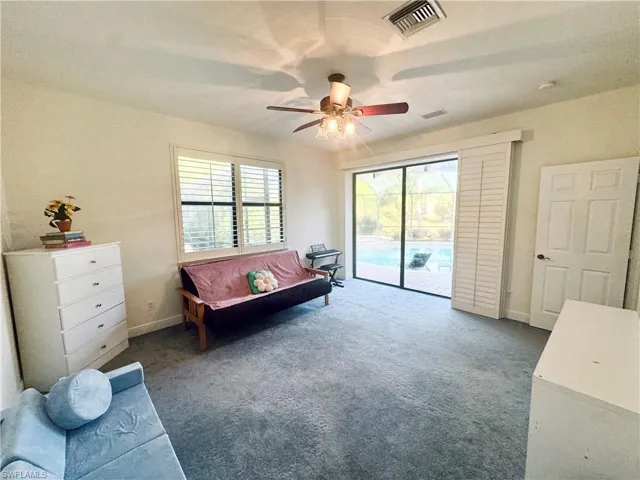 Den/Playroom over looking pool and lake
