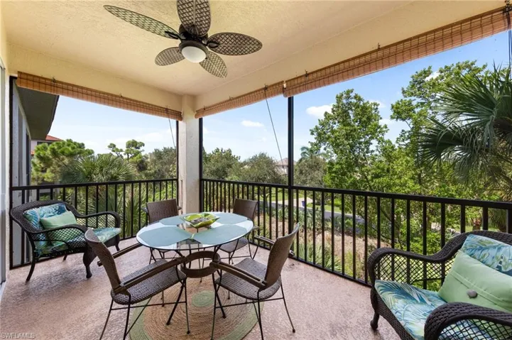 Enjoy Florida Evenings on this lanai, overlooking treetops.