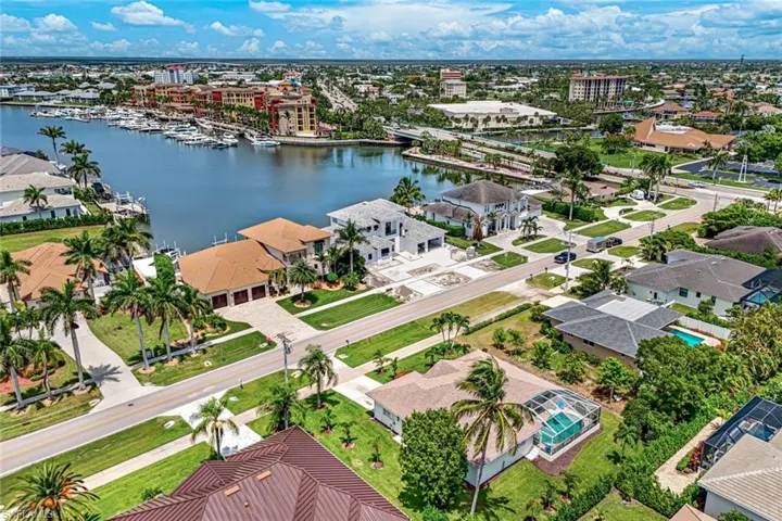 Aerial view of a nearby body of water and numerous boat docks