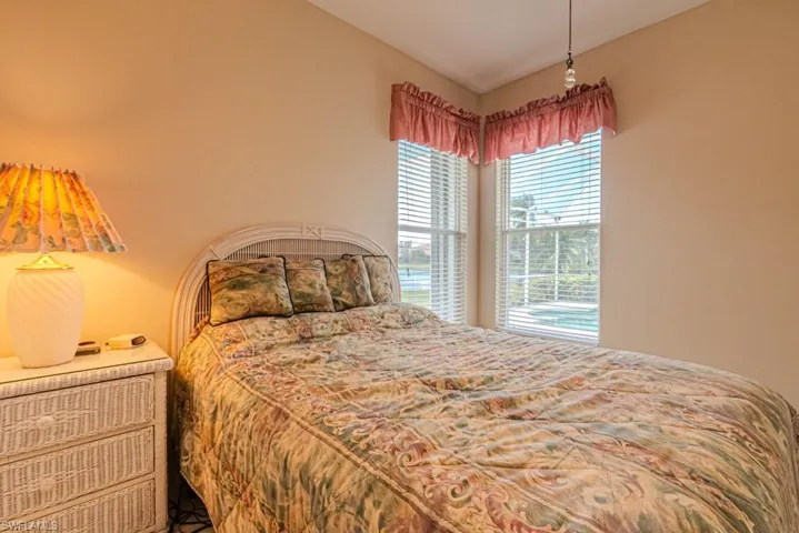 View of bedroom #2 looking out to the pool