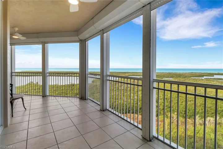 Screened in lanai with new ceiling fans, electric hurricane shutters and direct western views of the gulf.
