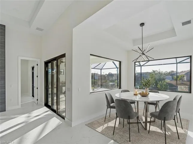 Detailed view of a large fireplace and baseboards