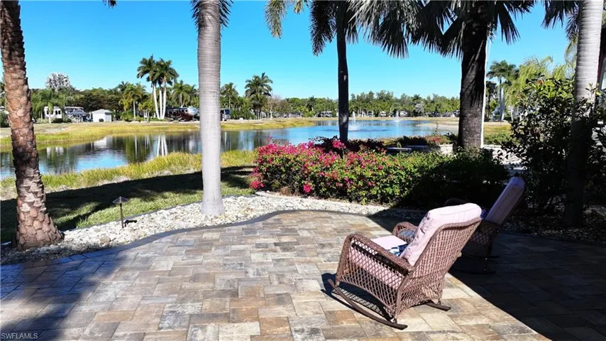 View of patio featuring a water view