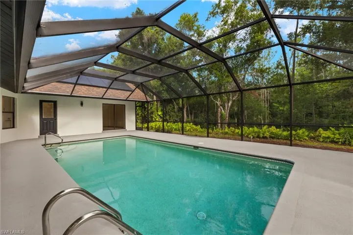 A  Newly Renovated Private oasis overlooking the 26 acre nature preserve that will NEVER be built on