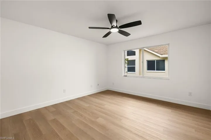4the Bedroom is expansive in size with a New Fan with Light, LVP Floors, 5 1/4" Baseboards, etc.