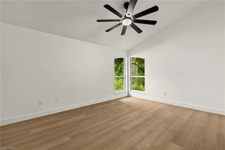 Guest Bedroom with Custom Designed Dual Windows overlooking the 26 Acre Nature Preserve