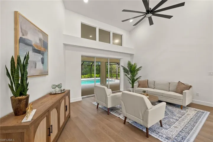 Formal Living Room with Vaulted Ceilings, New Led Recess, New 72" Fan & Triple Pocket Sliders