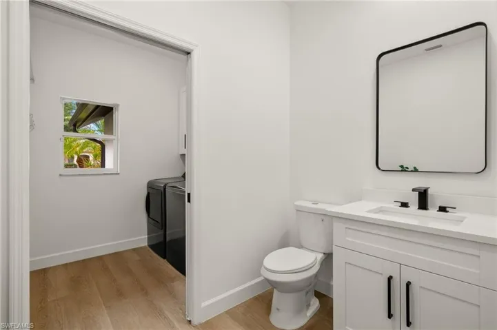 Half Guest Bath with Shaker Vanity, Quartz Counters, Black Hardware, Faucet & Mirror & New LED Lighting