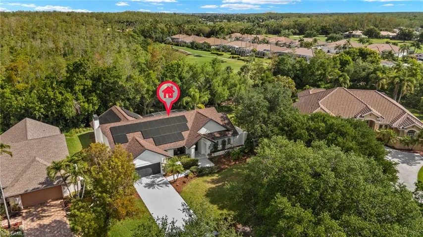 This Aerial shows the large 26 Acre Nature Preserve and the peek a boo view of Heritage Palms Golf Course