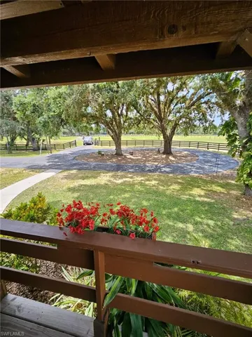 View of yard featuring fence