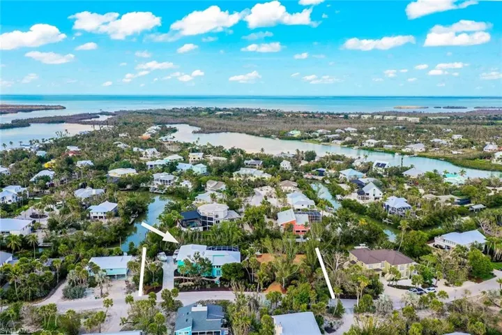 Aerial view of home, canal, Gulf