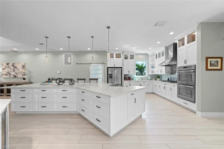 Kitchen with a large island and quartz countertops