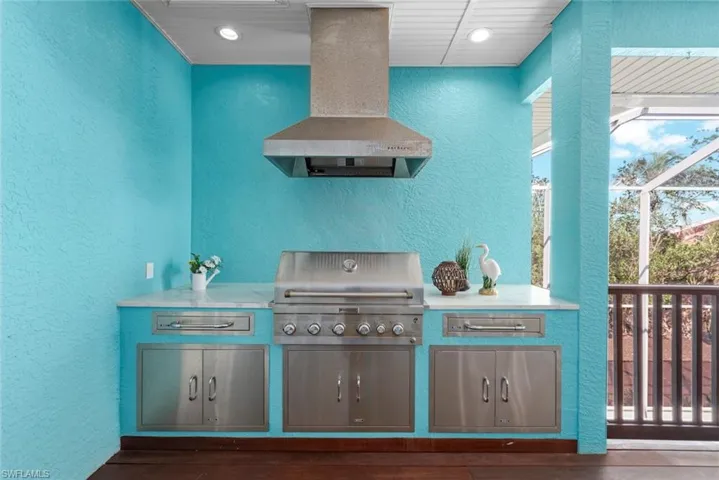 Outdoor kitchen with built-in grill