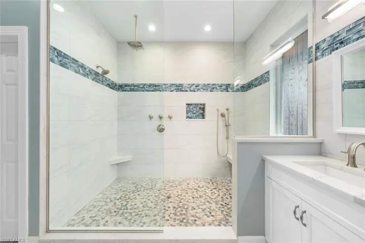 Primary Bathroom - gorgeous shower with multiple shower heads