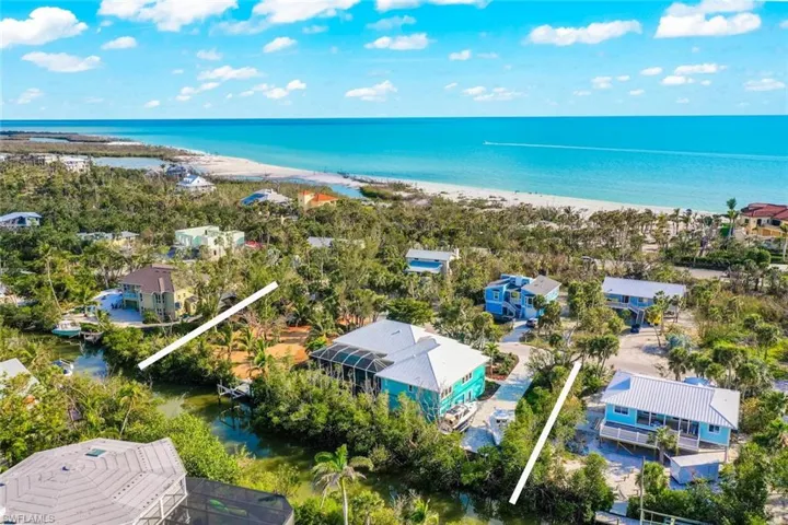 Aerial view of property and Gulf