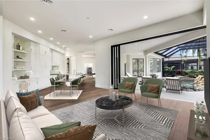 VIRTUALLY STAGED & Furnished Family Room, Kitchen and Pool.