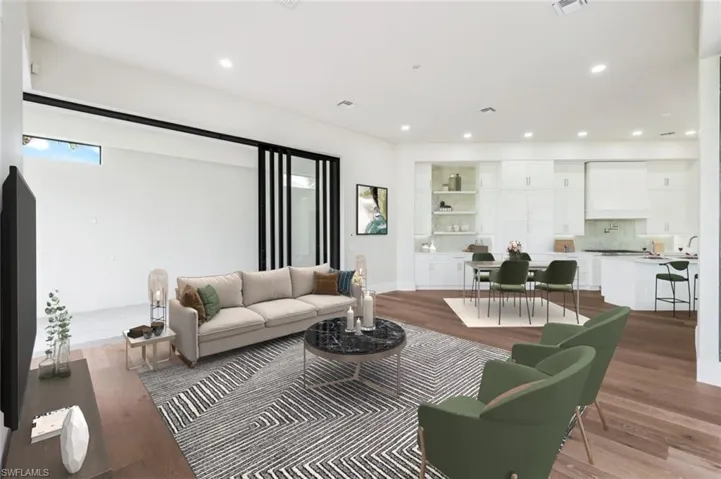 VIRTUALLY STAGED & FURNISHED Family/great room off kitchen.