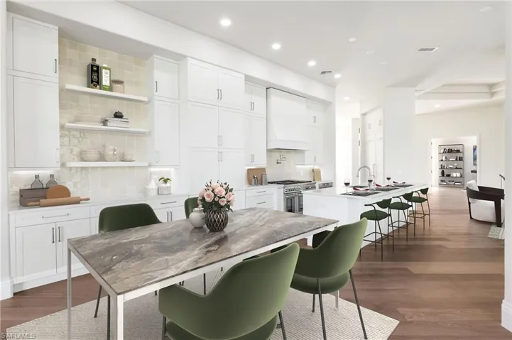 VIRTUALLY STAGED & FURNISHED Kitchen with Thermador appliances, custom cabinetry.