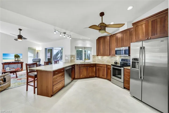 Entertain guests on the lanai or in family room from your kitchen