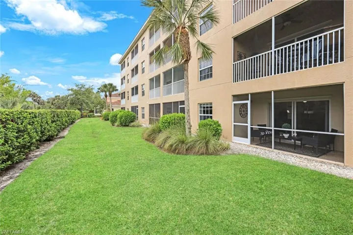 Walk out of lanai to nicely landscaped back yard