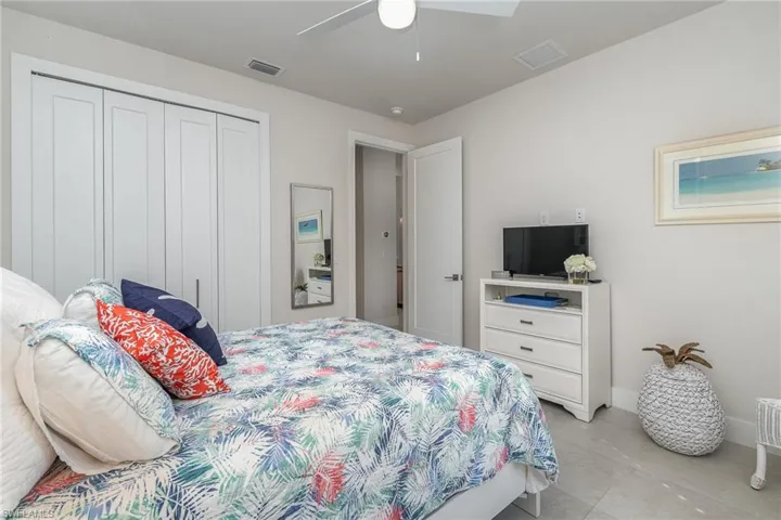 Bedroom with a closet and ceiling fan