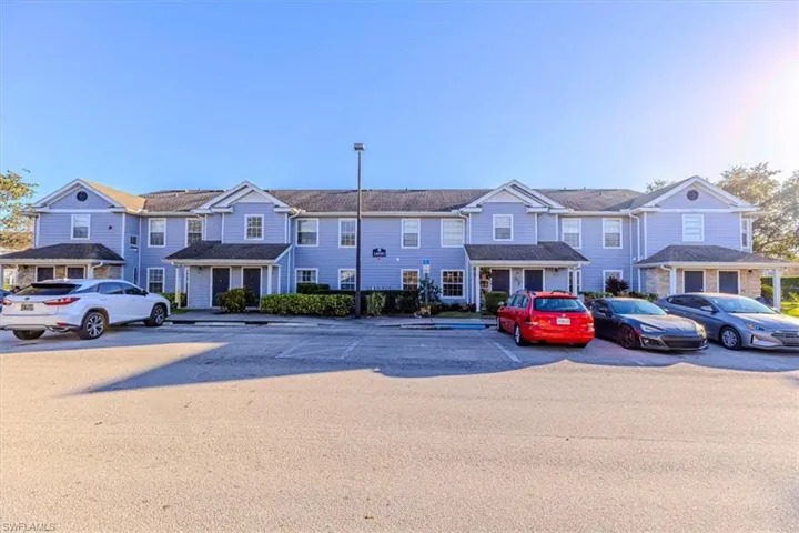 Traditional-style home featuring uncovered parking