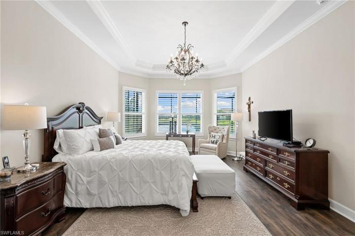 Primary bedroom with bay window.