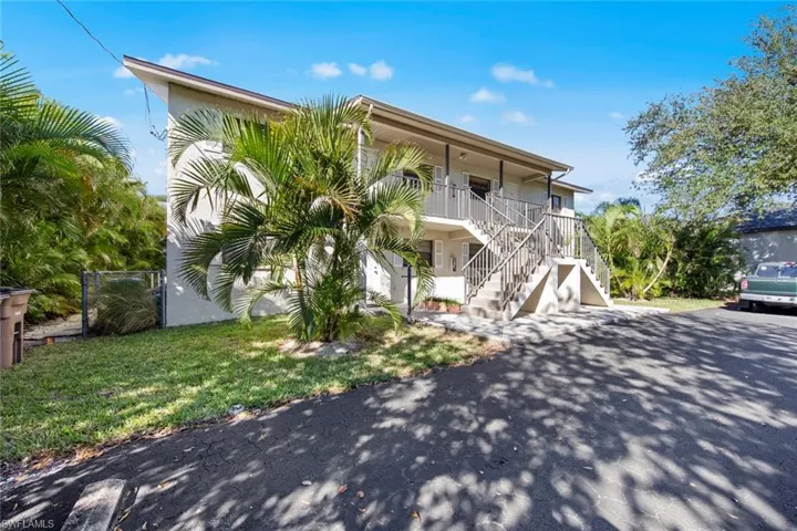 View of front of property with a front lawn